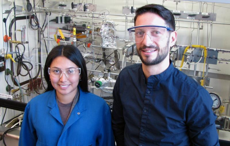Two Stanford researchers in the lab