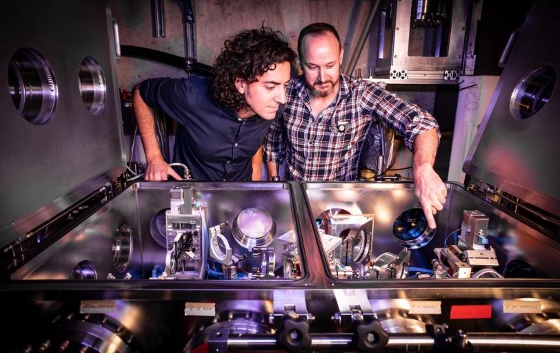 Claudio Emma and Brendan O’Shea examine experimental apparatus.