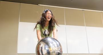 SAGE campers have fun experimenting with a Van de Graff generator